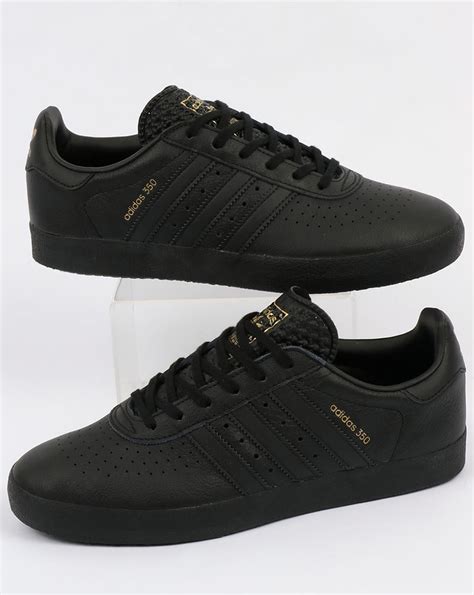 cheap all black adidas shoes|adidas originals black shoes.